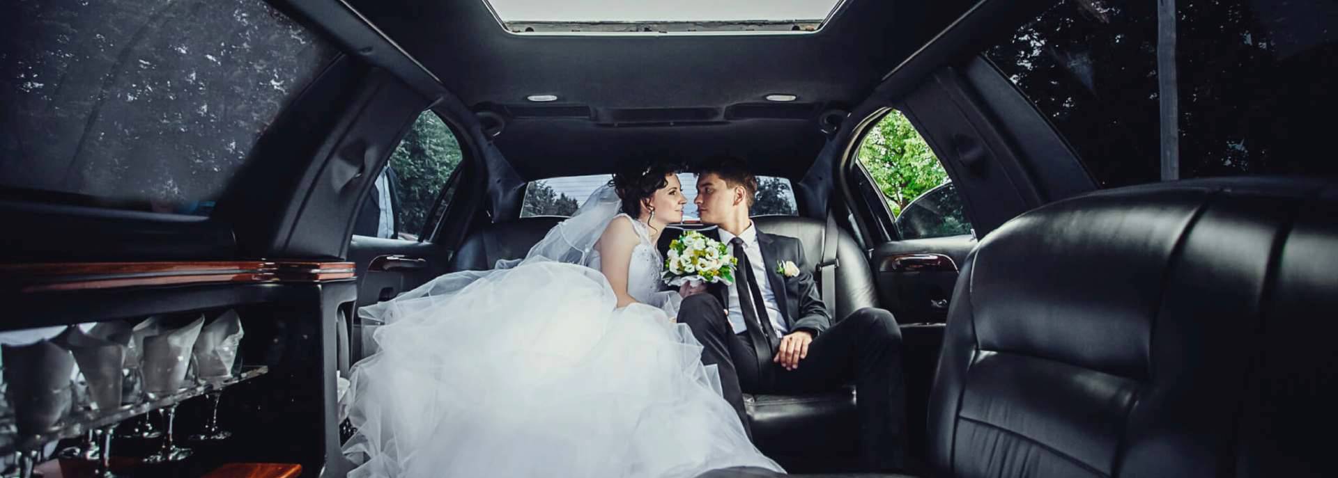 Early spring wedding transportation with luxury chauffeur service and decorated bridal car