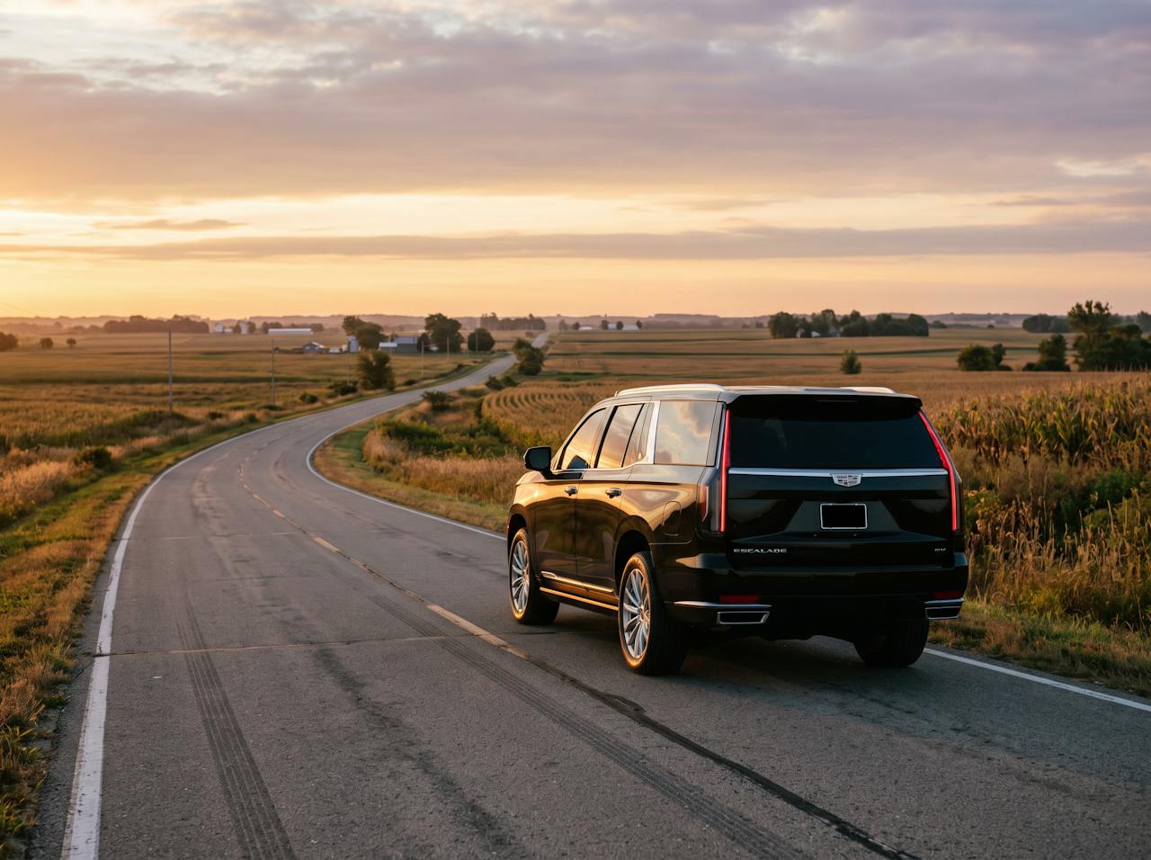 Placeholder image (AI-generated): a black Cadillac Escalade ESV on a quiet country highway at sunrise.